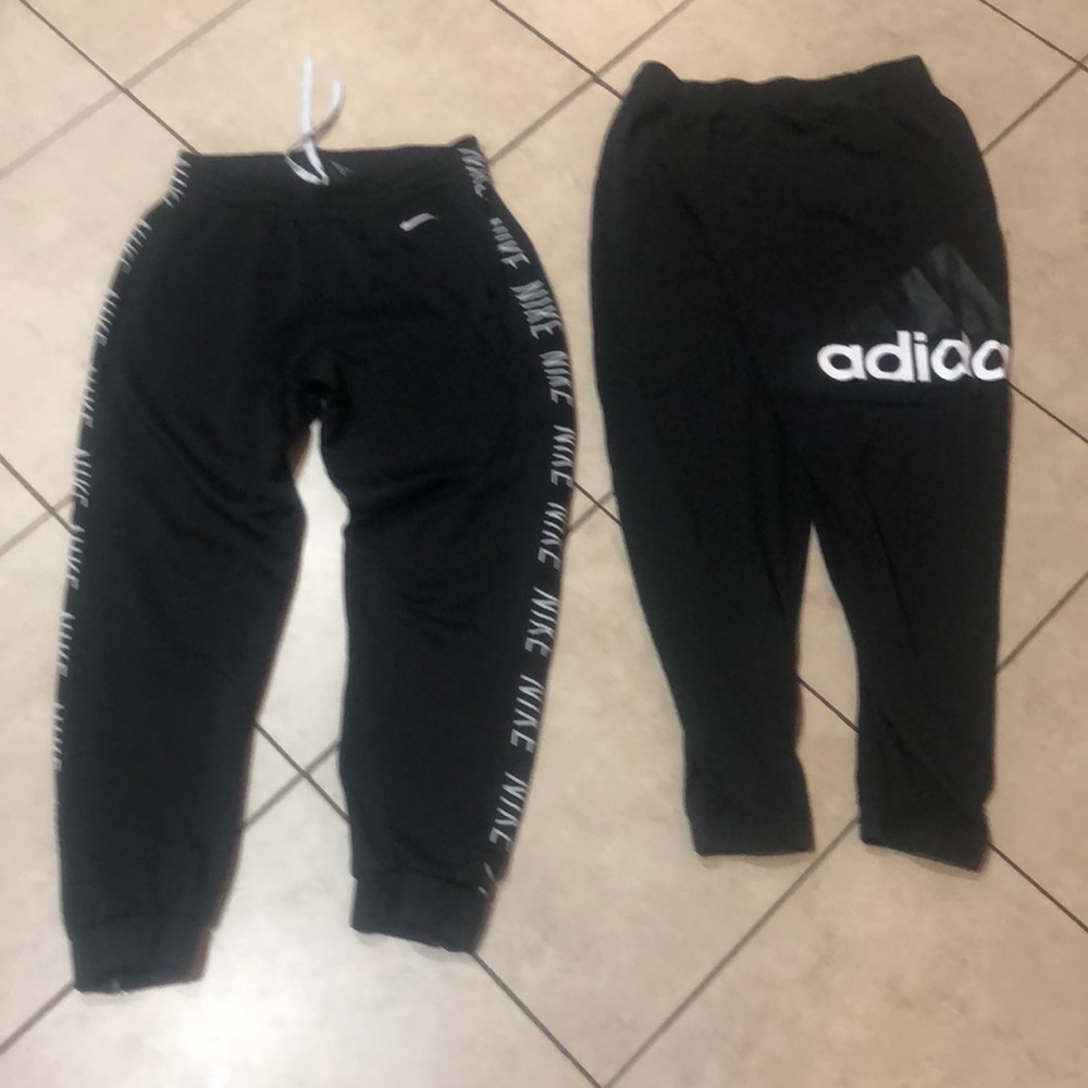 2 pairs of sweatpants 1 Nike and 1 adidas